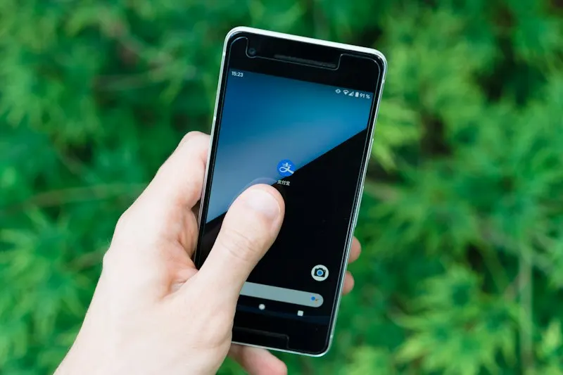 Checking a phone on the go